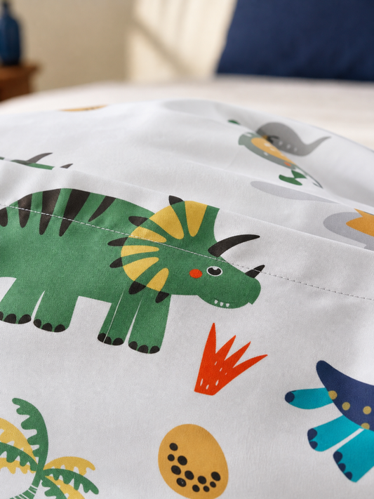 Fabric detail of the dinosaur print cotton blend