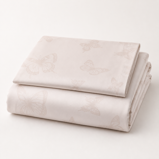 Blush Pink Twin Duvet Set folded on a white studio background