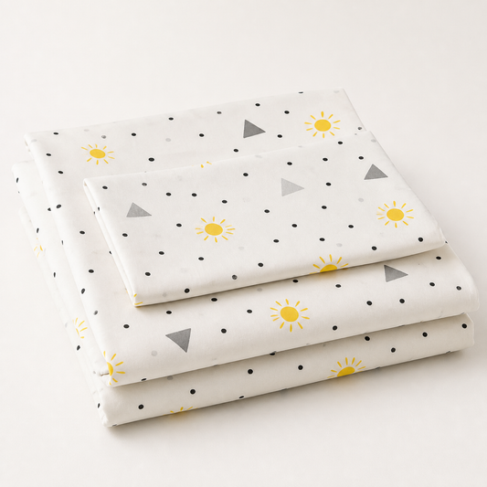 Sunshine Organic Cotton Sheet Set folded on a white studio background
