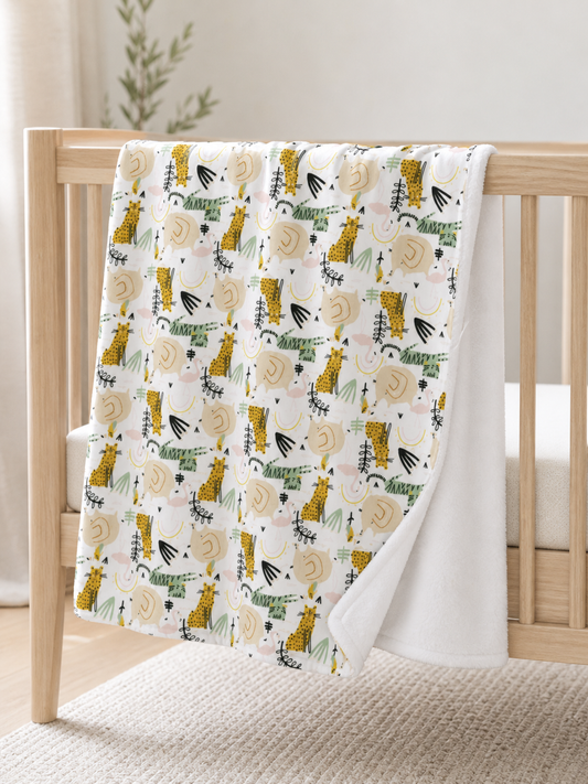 Tan safari 2-layer muslin and plush baby blanket over a crib rail