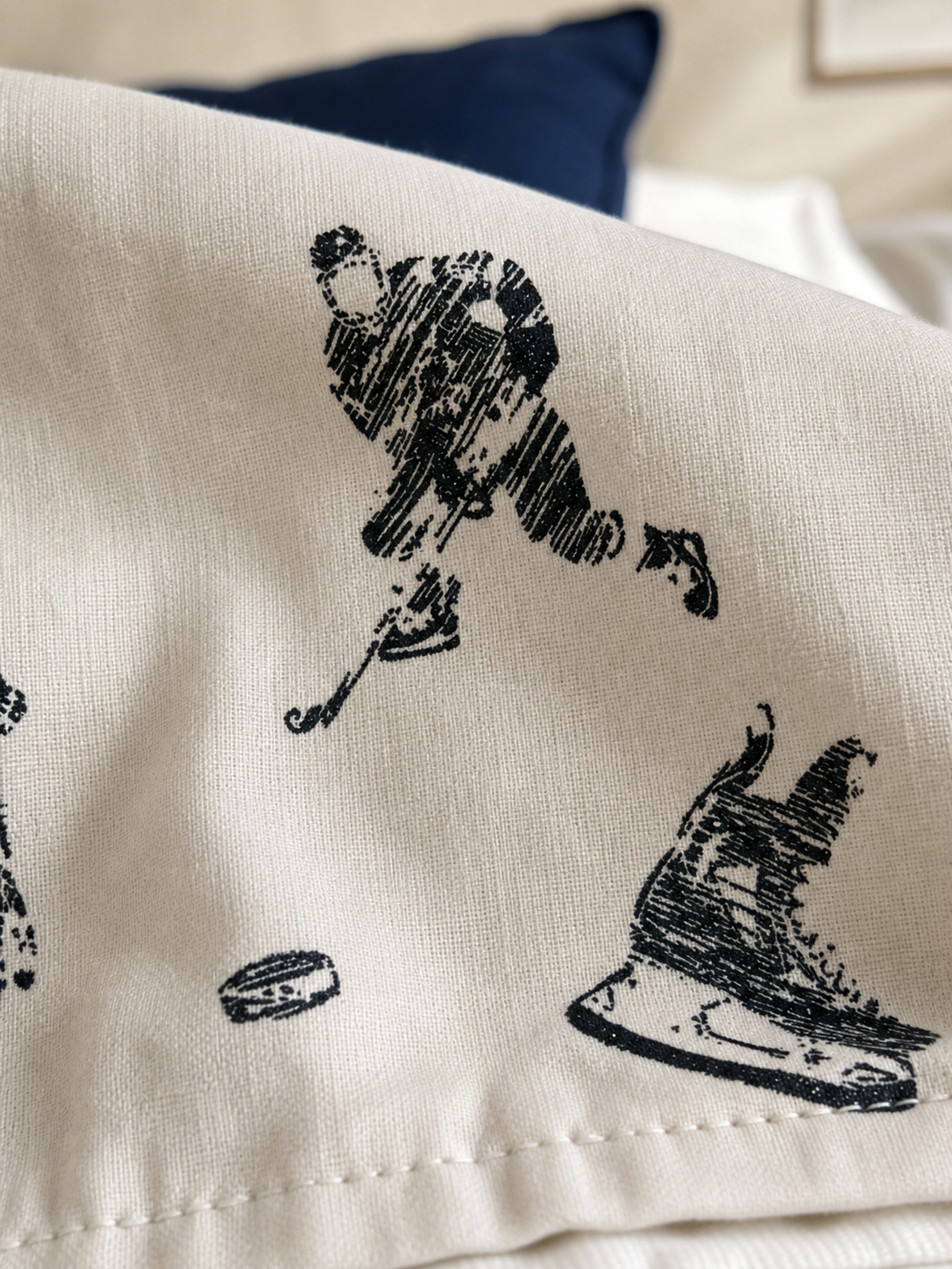 Fabric detail of the hockey sketch print flannel