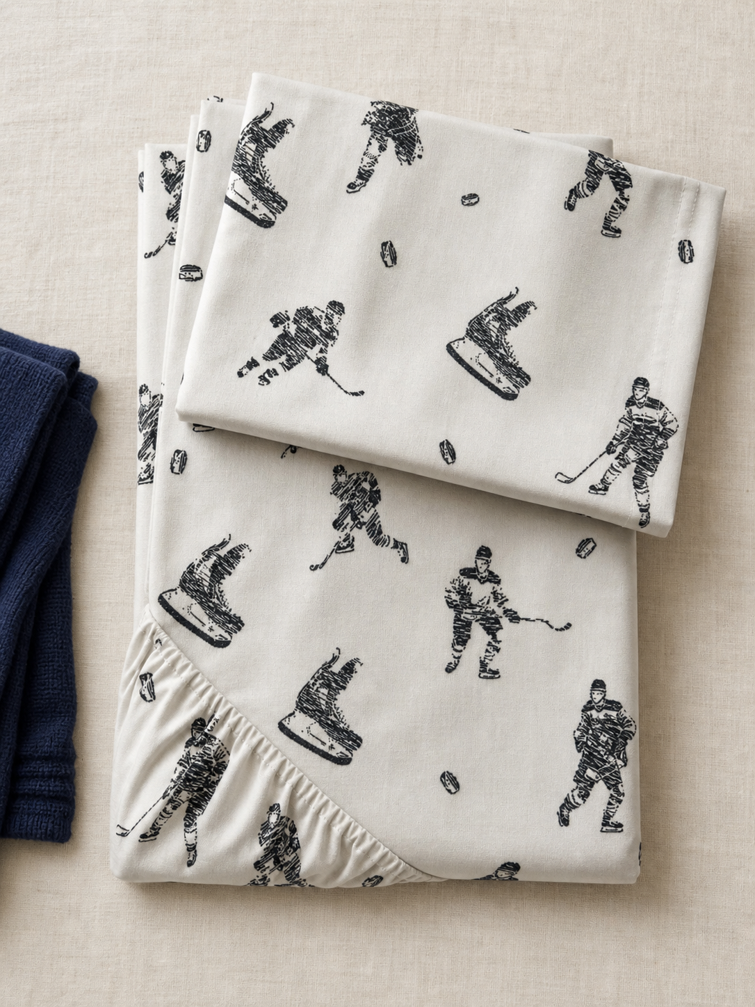 Flat lay of the hockey print Twin flannel sheet set