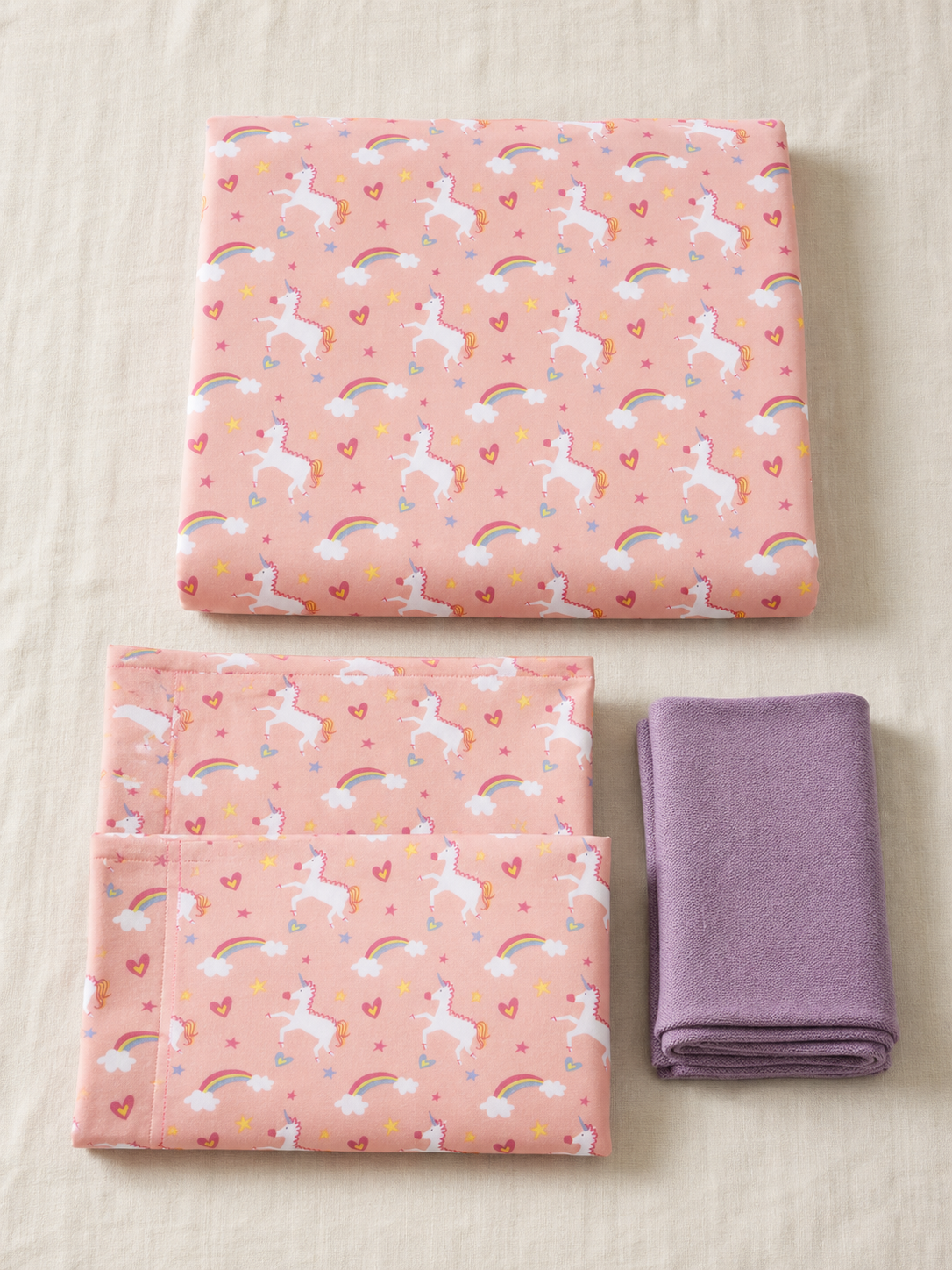 Flat lay of the pink unicorn Twin duvet cover set