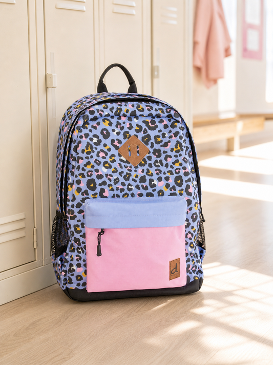 Blue leopard print kids backpack hanging on a school locker