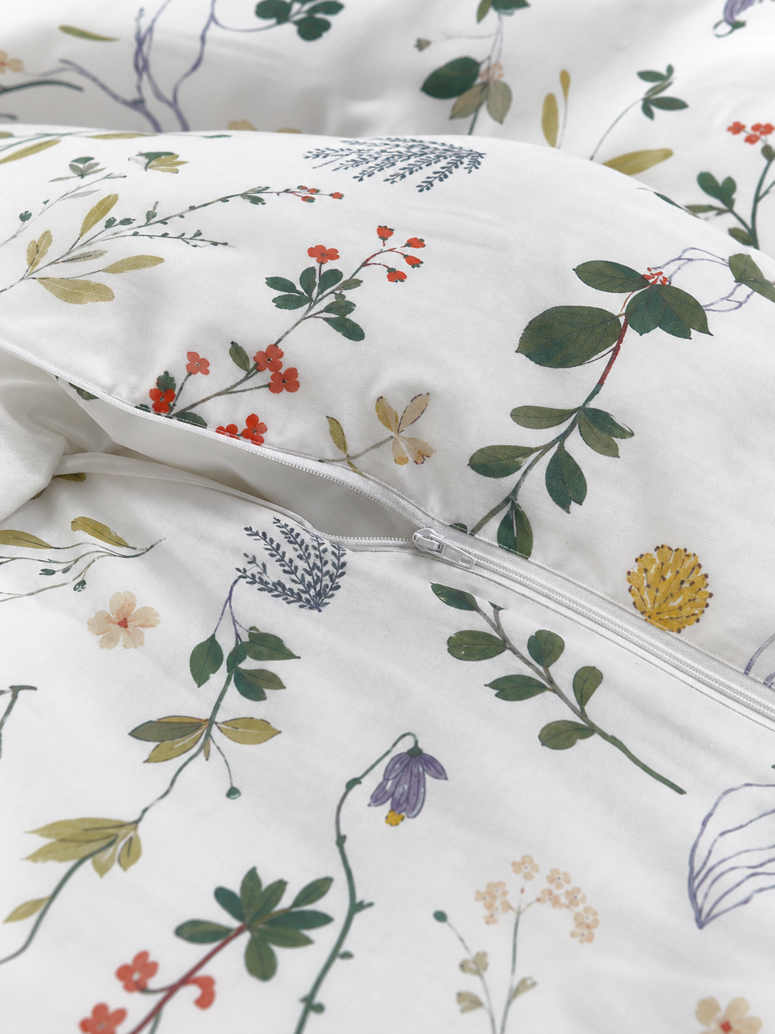 Hidden zipper and fabric texture detail on the wildflower duvet cover
