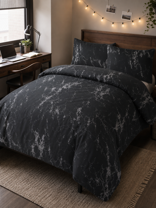 Black marble print Queen duvet cover set made up on a bed