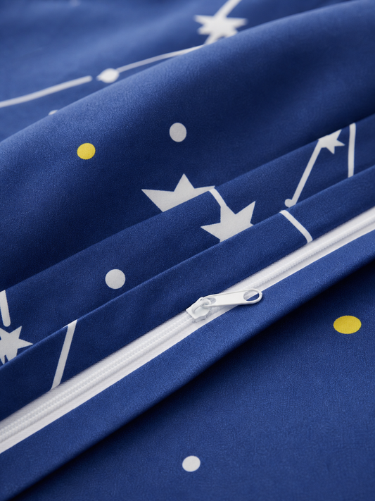 Hidden zipper and fabric texture detail on the galaxy duvet cover