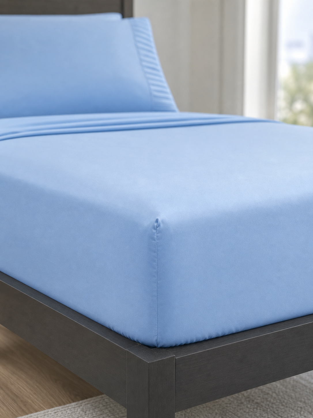 Fitted corner detail of the light blue Twin XL sheet