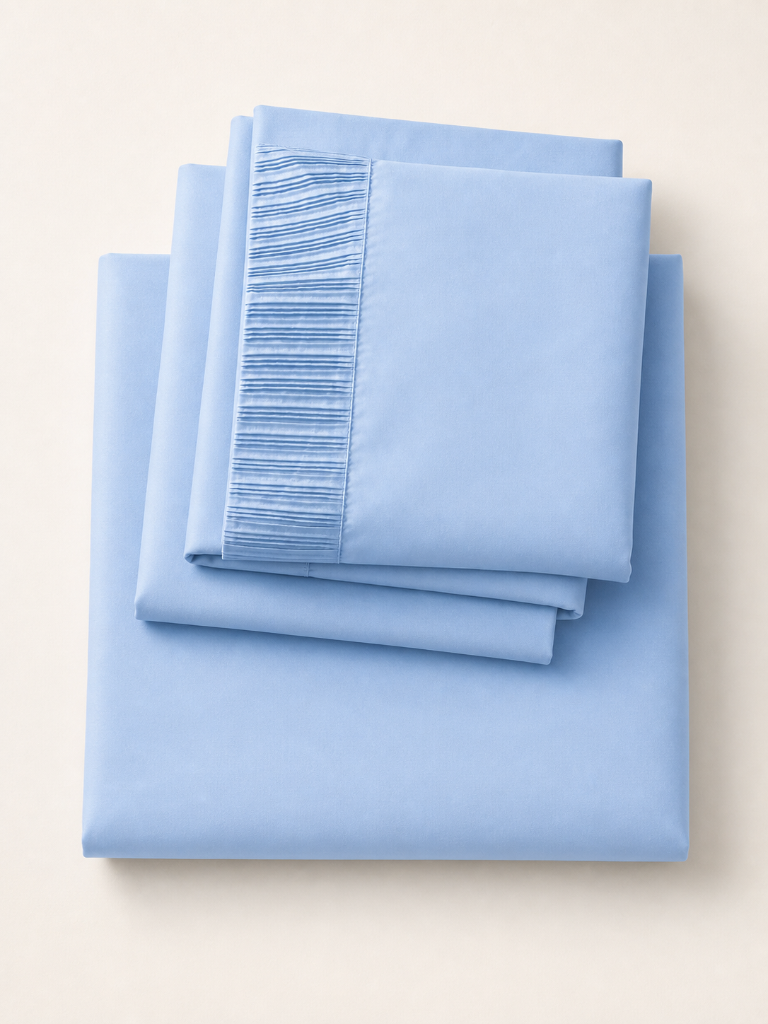 Flat lay of the light blue 4-piece Twin XL sheet set