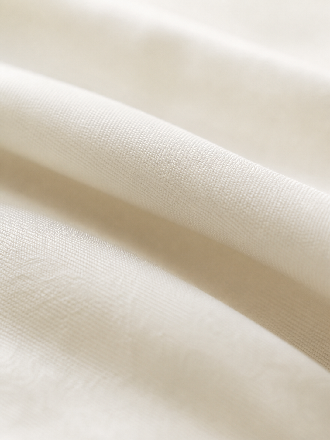 Macro detail of the 800 thread count long-staple cotton weave