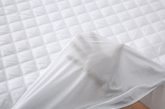 Close-up of the quilted surface and stitching on the Twin XL mattress pad