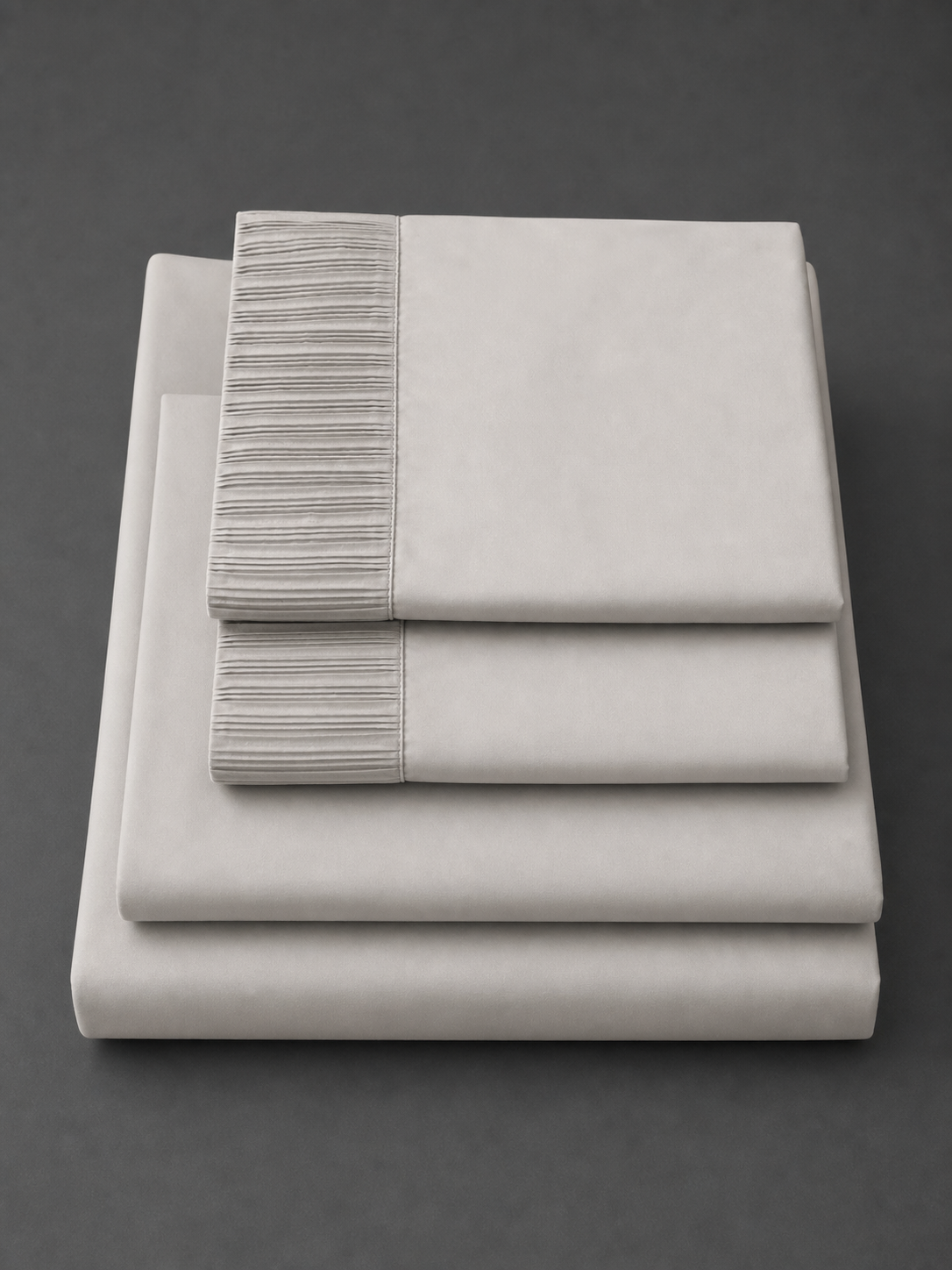Flat lay of the taupe 4-piece Twin XL sheet set